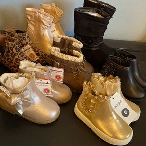 Seven pairs of toddler size 6 boots